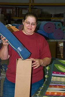 worker packing merchandise