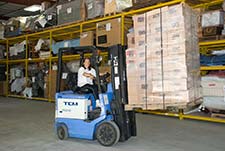 fork lift operator in warehouse